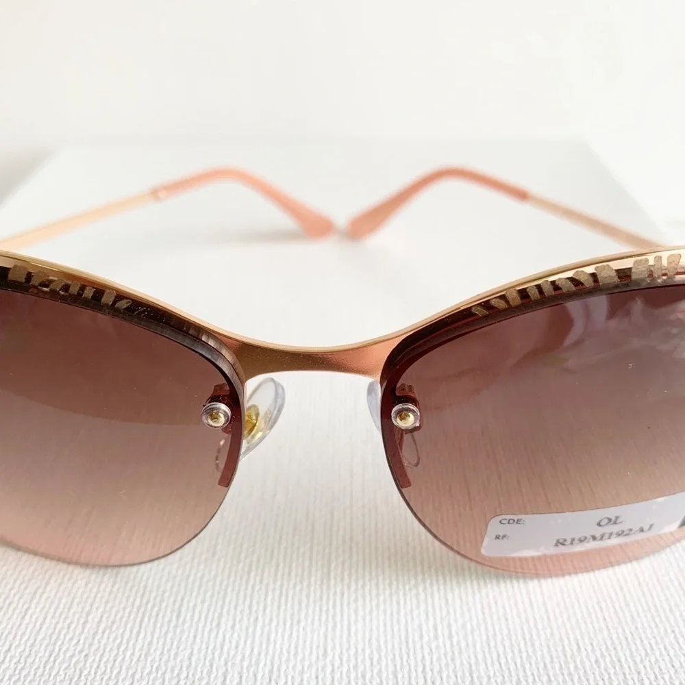 NWT pink and rose gold semi rimless sunglasses